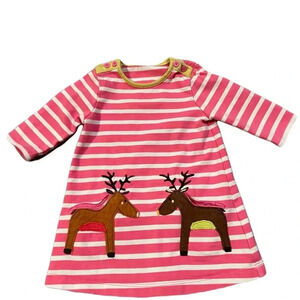 Appliqué dress with pockets size 3-6 months.